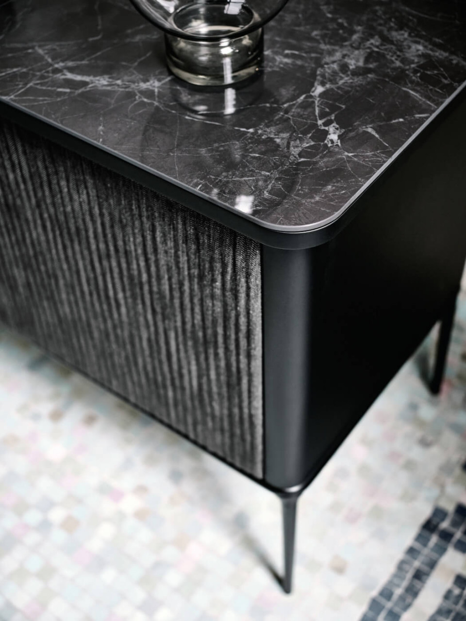 Detail of the marble-effect ceramic top of the Lea sideboard